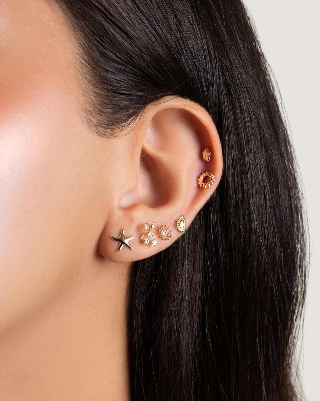 PIERCING WITH CRYSTAL IN 14K YELLOW GOLD