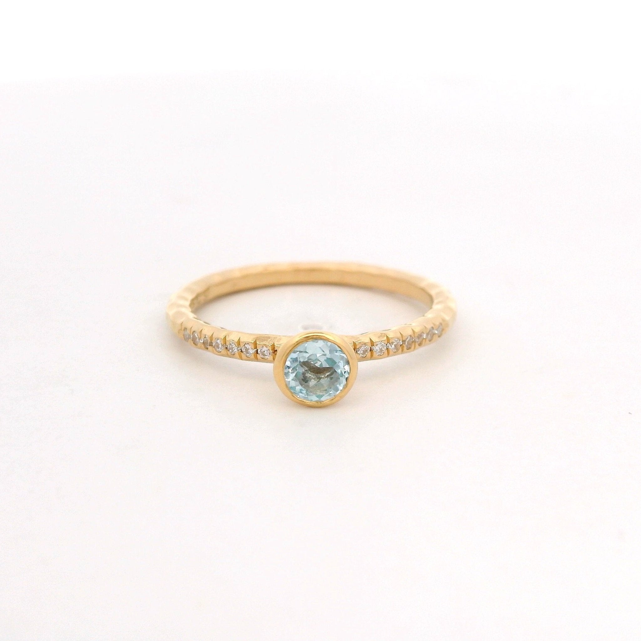 925YG BEZEL TOPAZ BLUE SOLITARY RING T6.5 - C'SANTOS