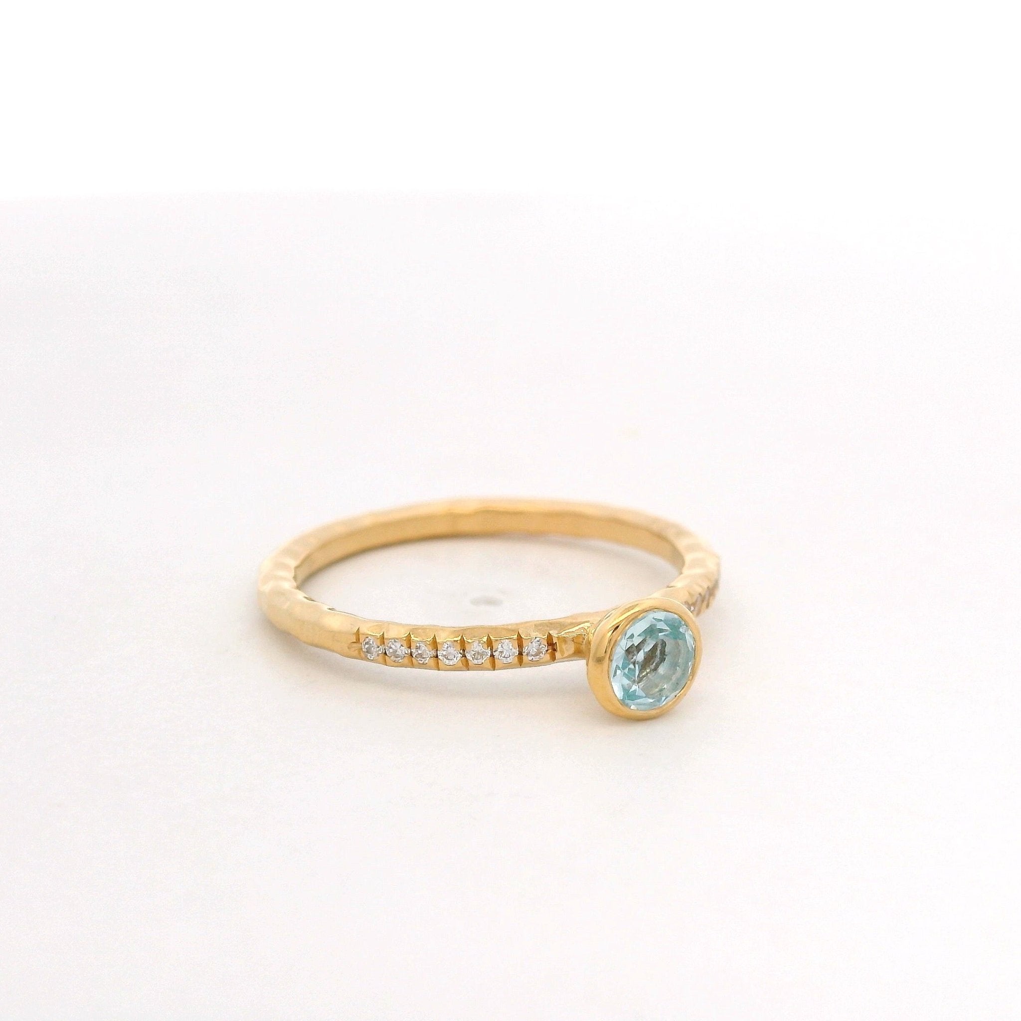 925YG BEZEL TOPAZ BLUE SOLITARY RING T6.5 - C'SANTOS
