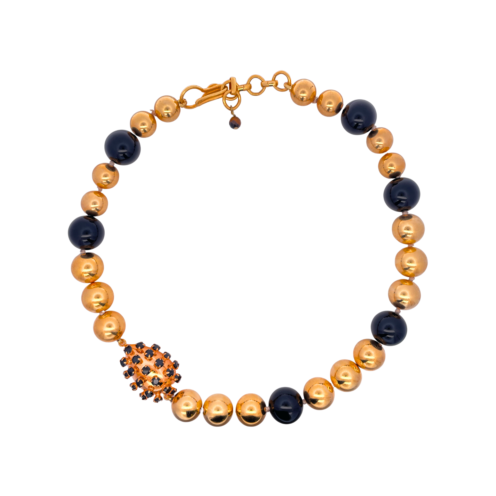 NECKLACE GOLD AND BLACK ONYX BALLS WITH A PEAR SHAPE METAL STUDED WITH WHITE TOPAZ STATION