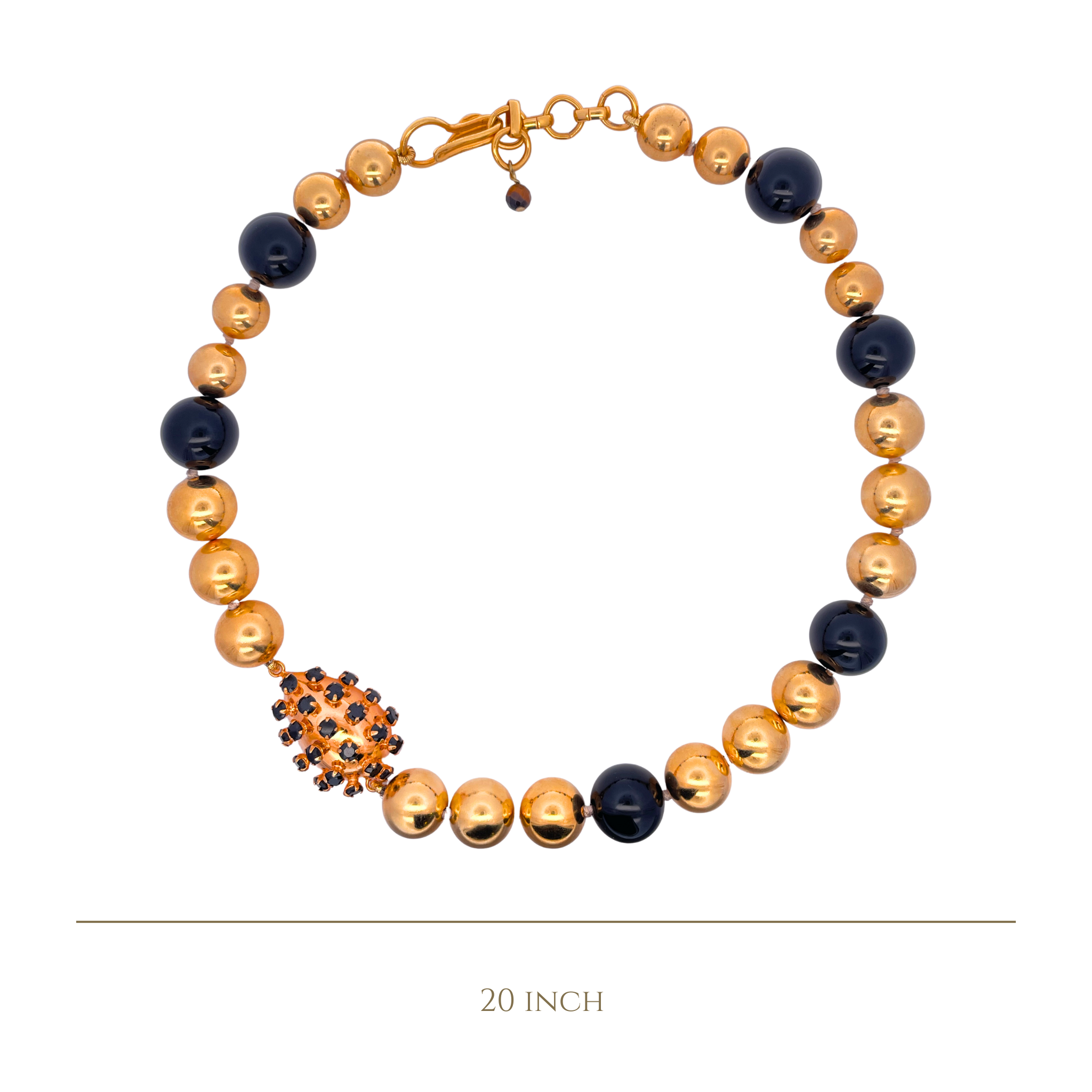 NECKLACE GOLD AND BLACK ONYX BALLS WITH A PEAR SHAPE METAL STUDED WITH WHITE TOPAZ STATION