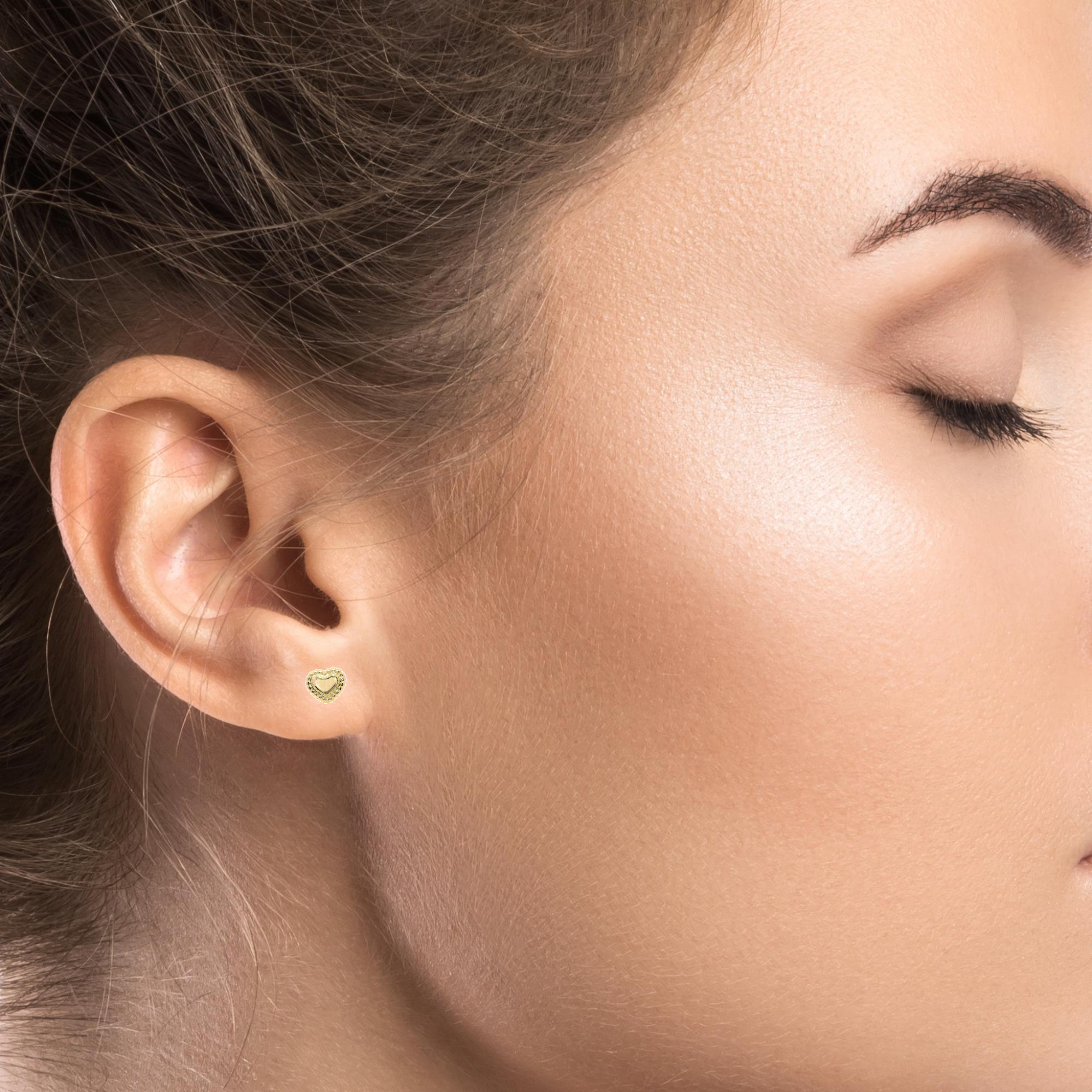 PIERCING TEXTURED HEART IN 14KT YELLOW GOLD