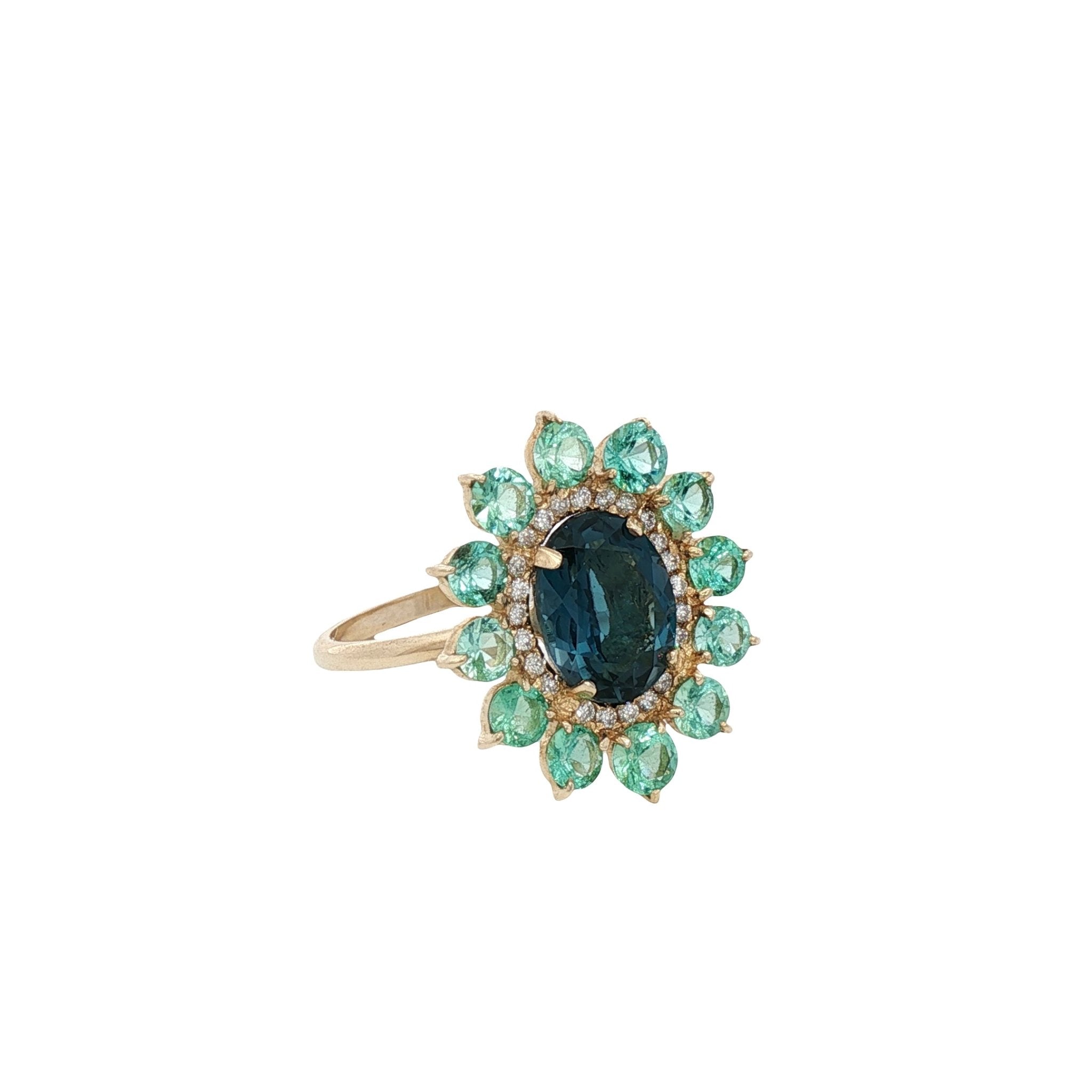 D0.12CT 14KY RING LONDON BLUE TOPAZ 4CT AND EMERALDS T6 - C'SANTOS