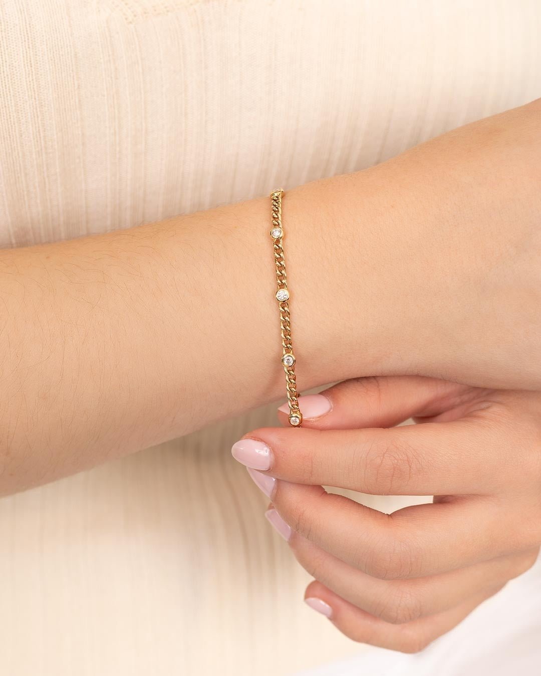 D0.25 14KY BREZEL DIAMOND STATION BRACELET - C'SANTOS