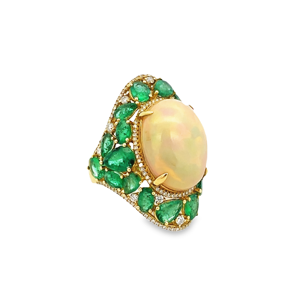 OPAL SURROUNDED BY EMERALDS STATEMENT RING SET IN 18K YELLOW GOLD