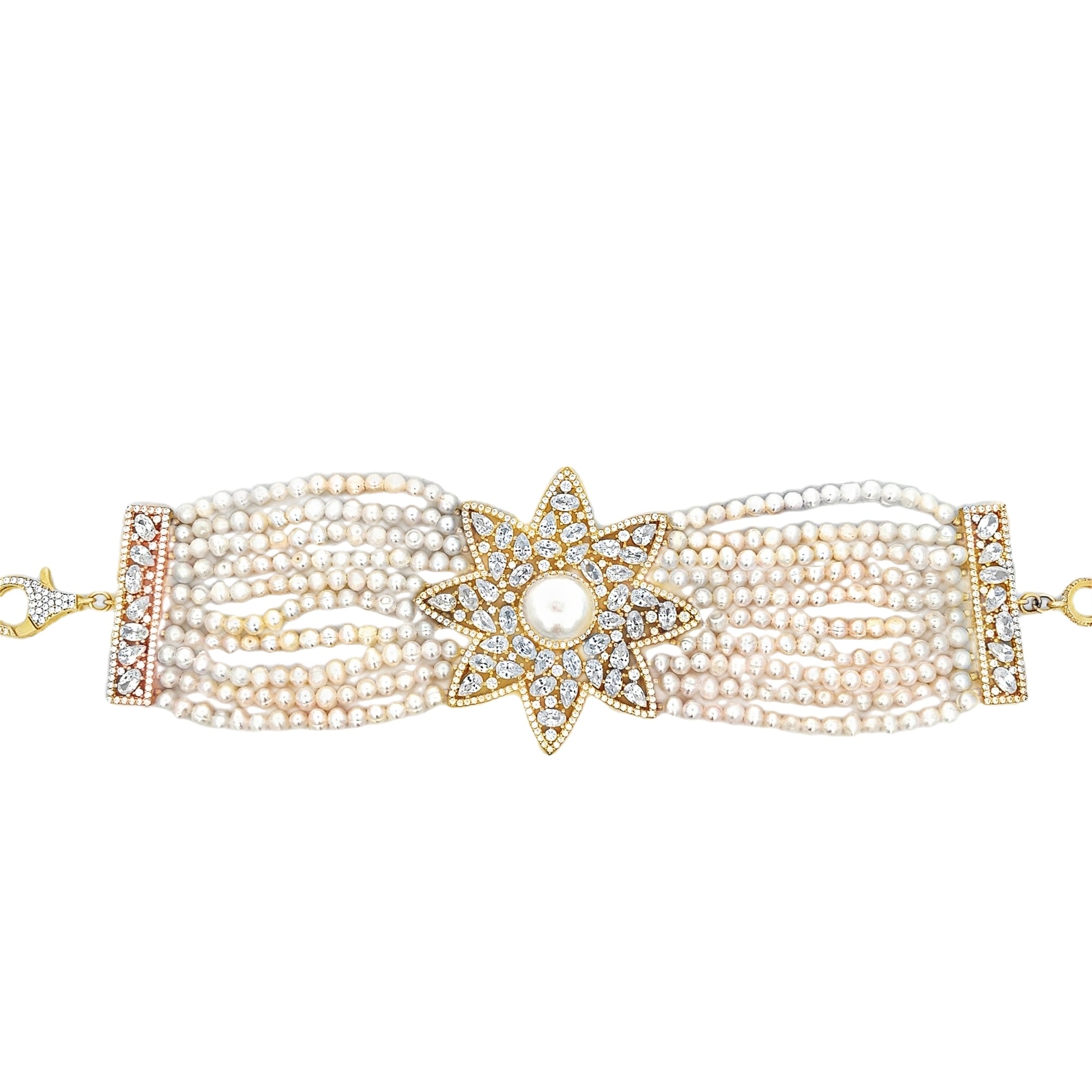 PEARL STRING BRACELET WITH CRYSTAL SUN CHARM