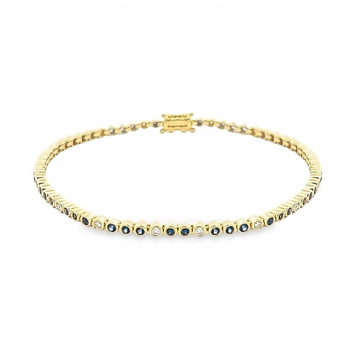 BLUE SAPPHIRE AND DIAMOND BEZEL BRACELET SET IN 14K YELLOW GOLD