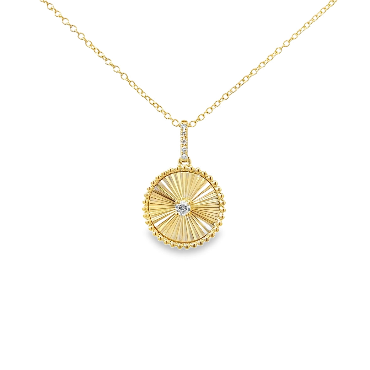 TEXTURED COIN WITH DIAMOND ACCENT NECKLACE SET IN 14K YELLOW GOLD