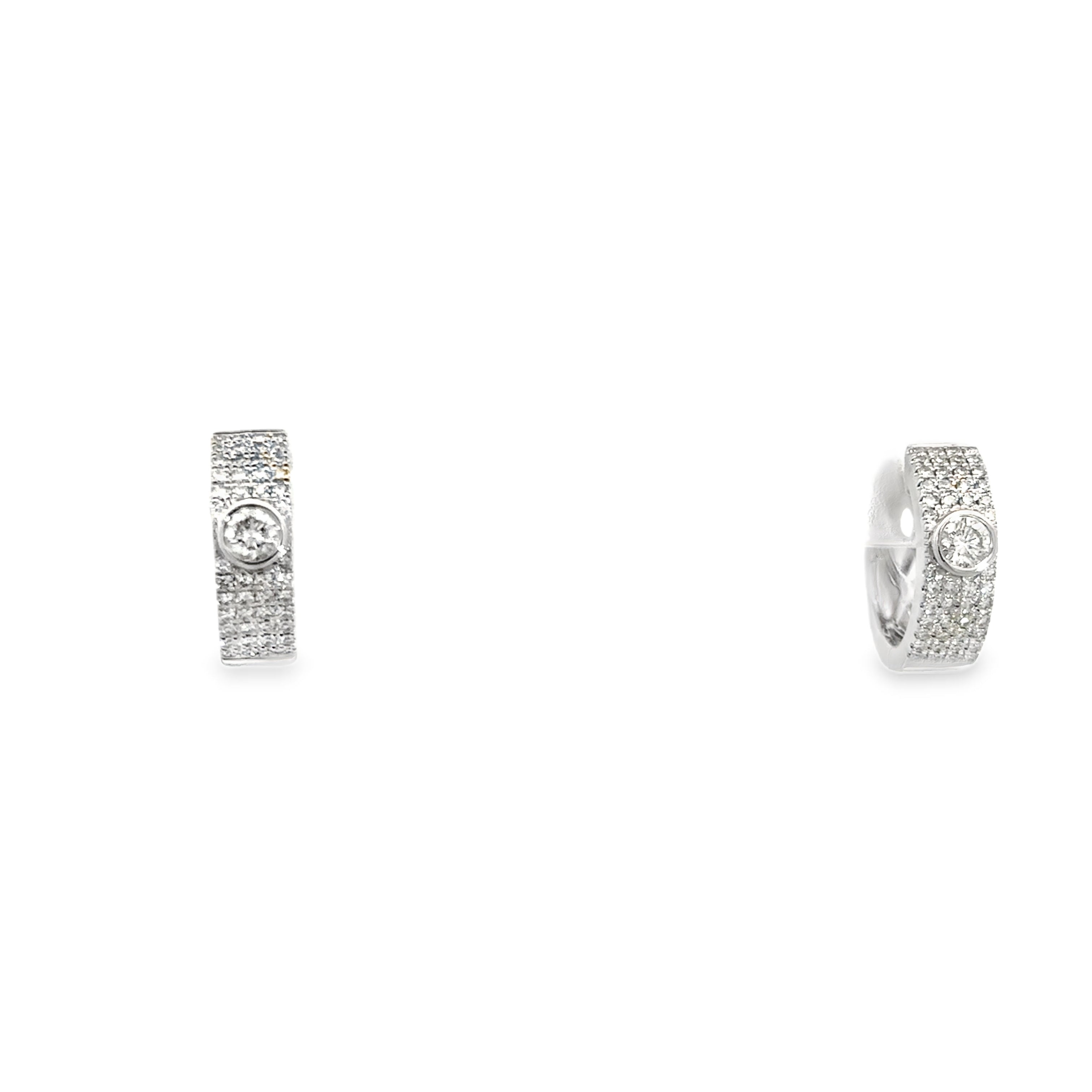 DIAMOND SEMI PAVÉ HUGGIES SET IN 14K WHITE GOLD