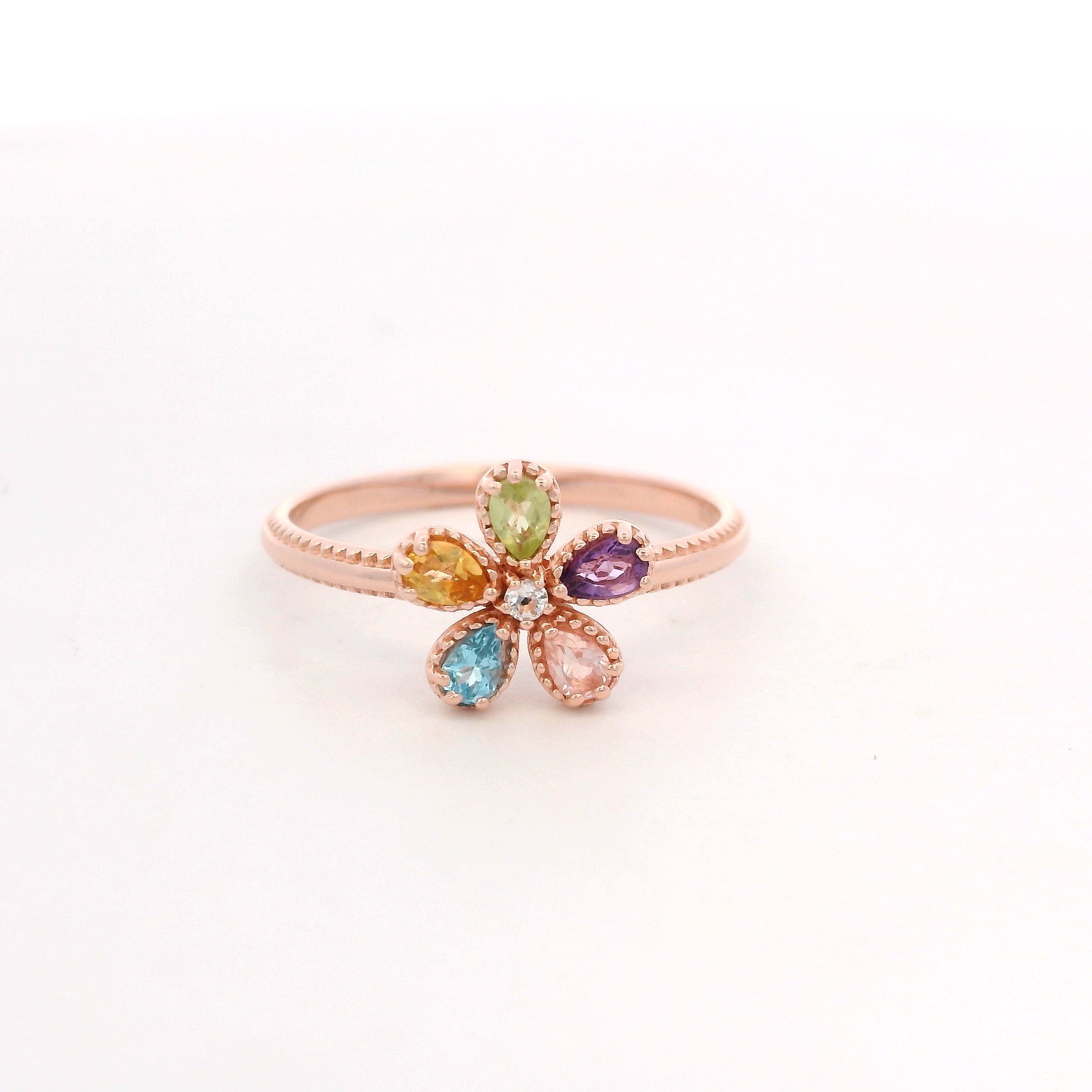 925RG FLOWER MULTISTONE CENTER TOPAZ WHITE RING T6.5