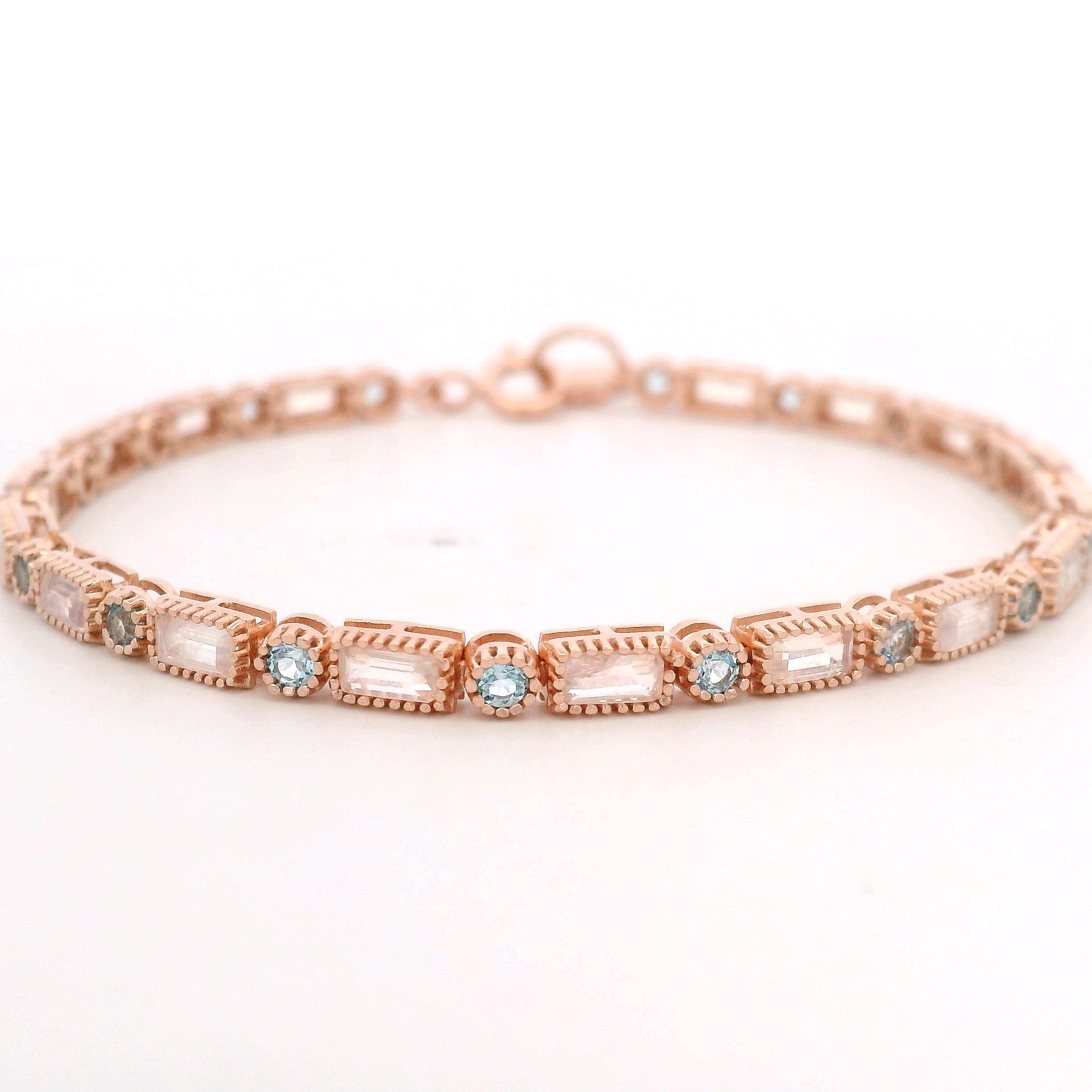 925RG TENNIS BAGUETTE MOOSTONE BEZL TOPAZ BLUE BRACELET