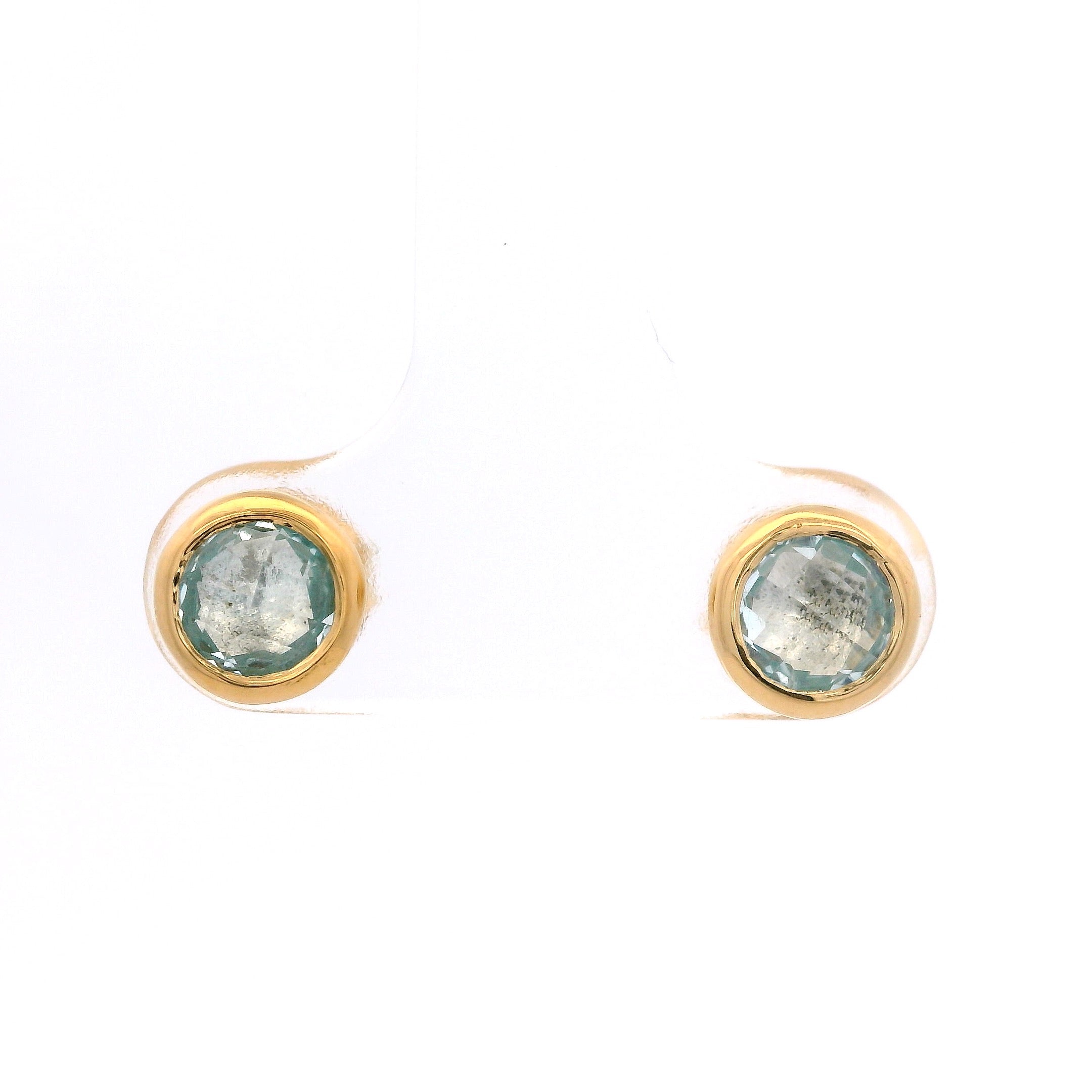 925YG BEZEL TOPAZ BLUE SOLITARY EARRINGS