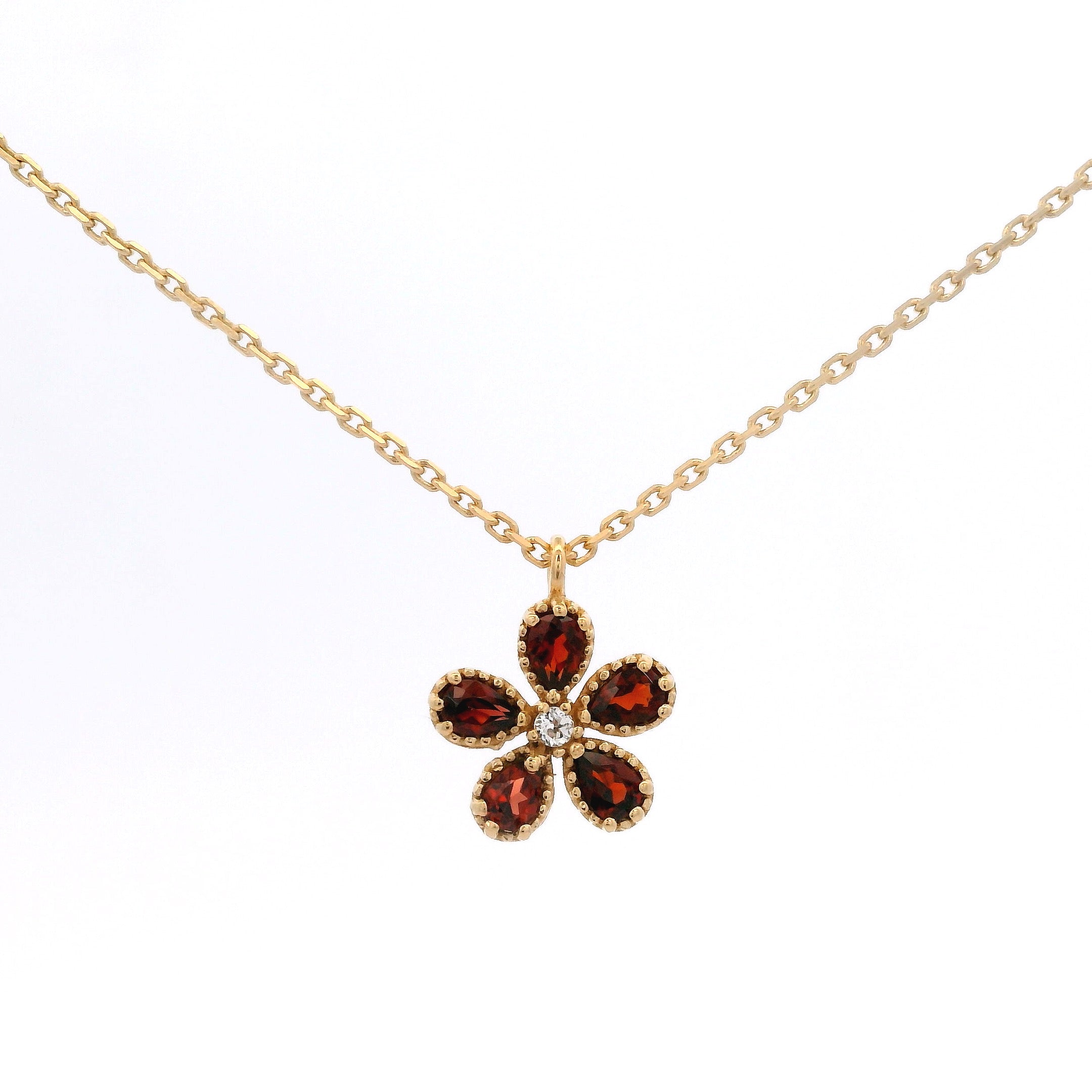 925YG FLOWER GARNET CENTER TOPAZ WHITE NECKLACE