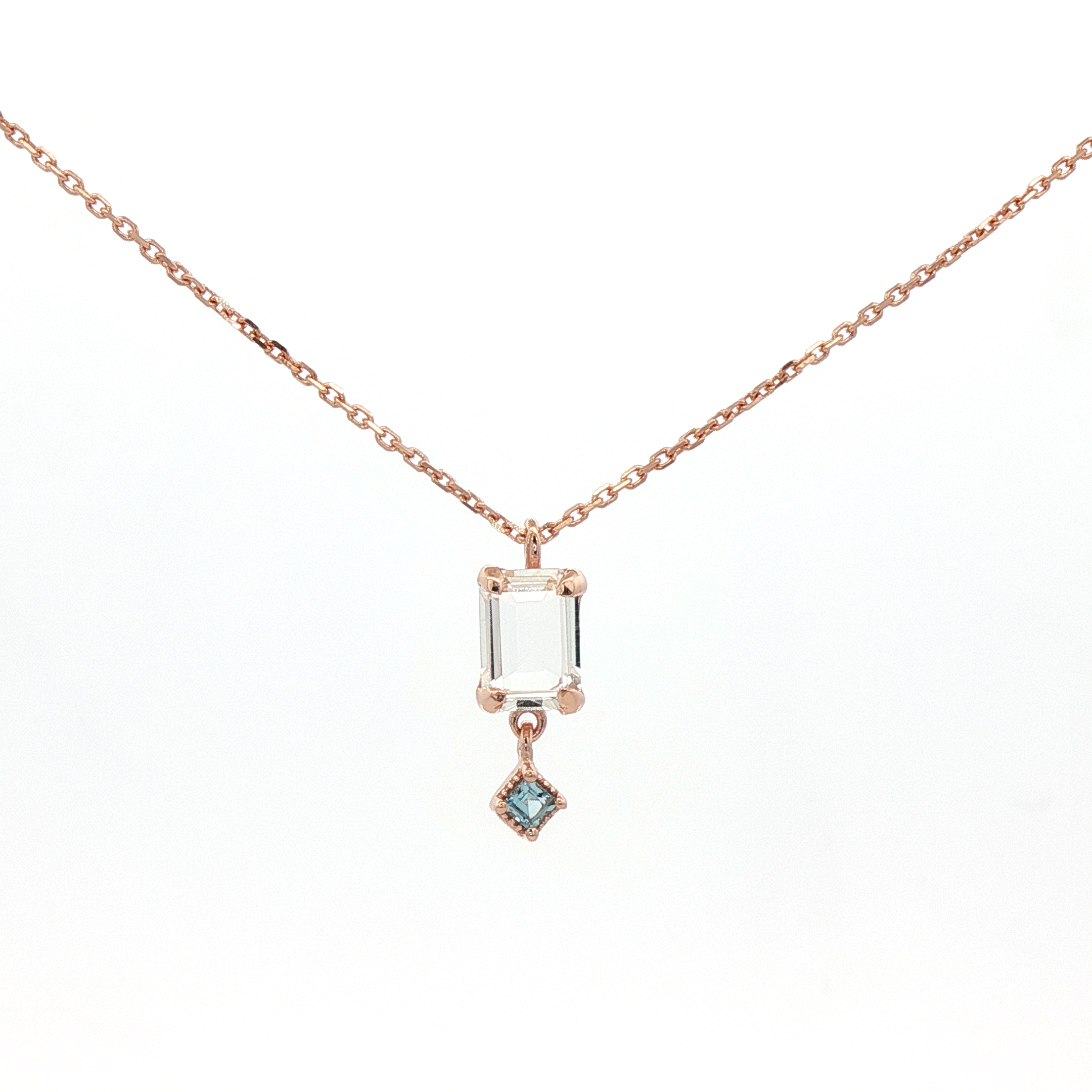 925RG EMERALD CUT ROCK CRYSTAL DROP TOPAZ BLUE NECKLACE