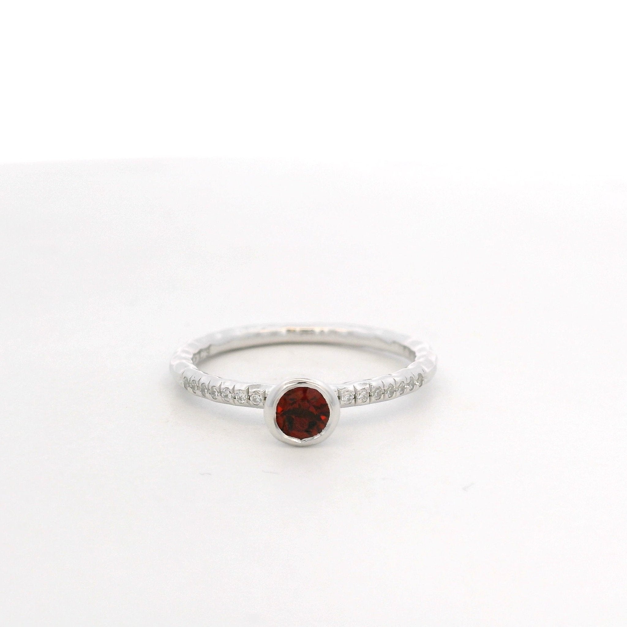 925SL BEZEL GARNET AND CZ RING T6.5 - C'SANTOS