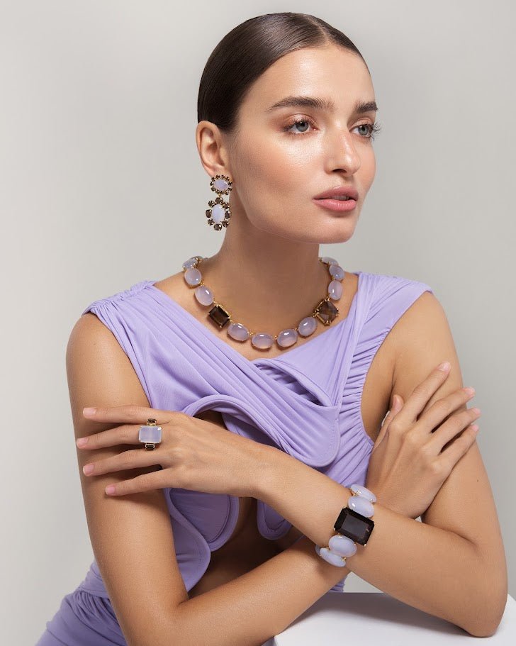 CUFF HINGED SET WITH 26X19 OVAL CHALCEDONY CABOCHONS AND EMERALD CUT 33X23 SMOKY QUARTZ CENTER - C'SANTOS