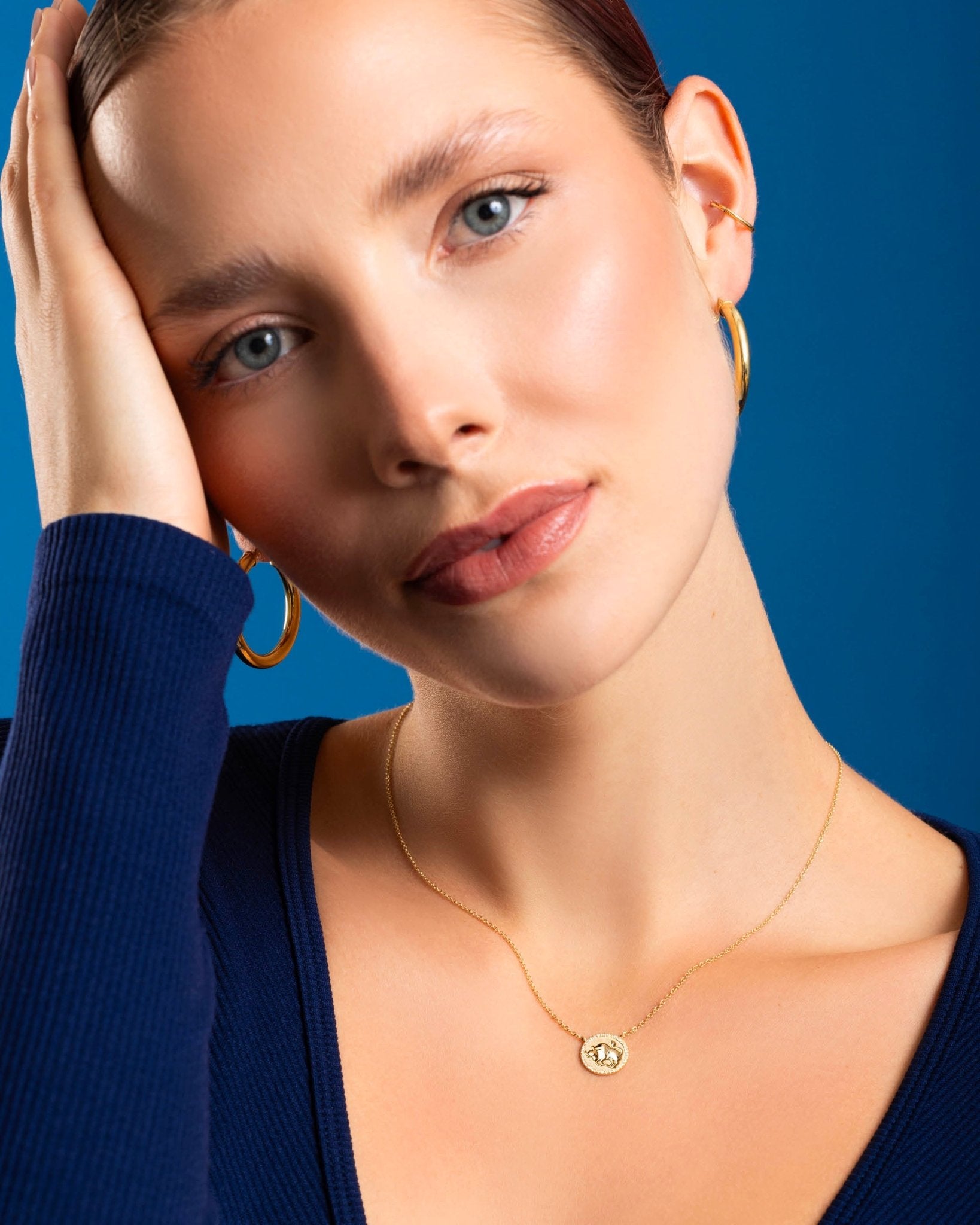 D0.08CT 14KY ZODIAC TAURUS NECKLACE - C'SANTOS