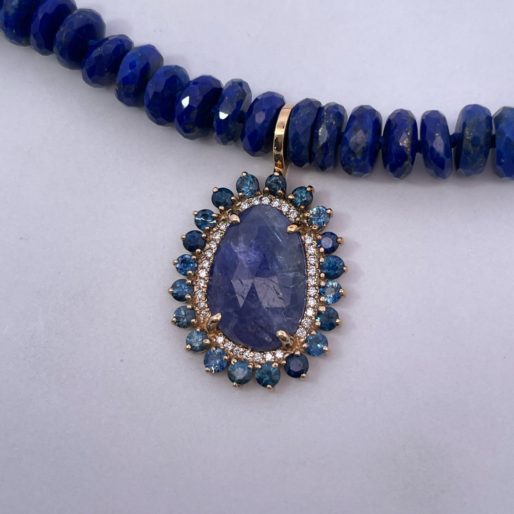 D0.17CT 14KY NECKLACE LAPISLAZULI TANZANITE CHARM 5.5CT AND BLUE SAPPHIRES HALO - C'SANTOS