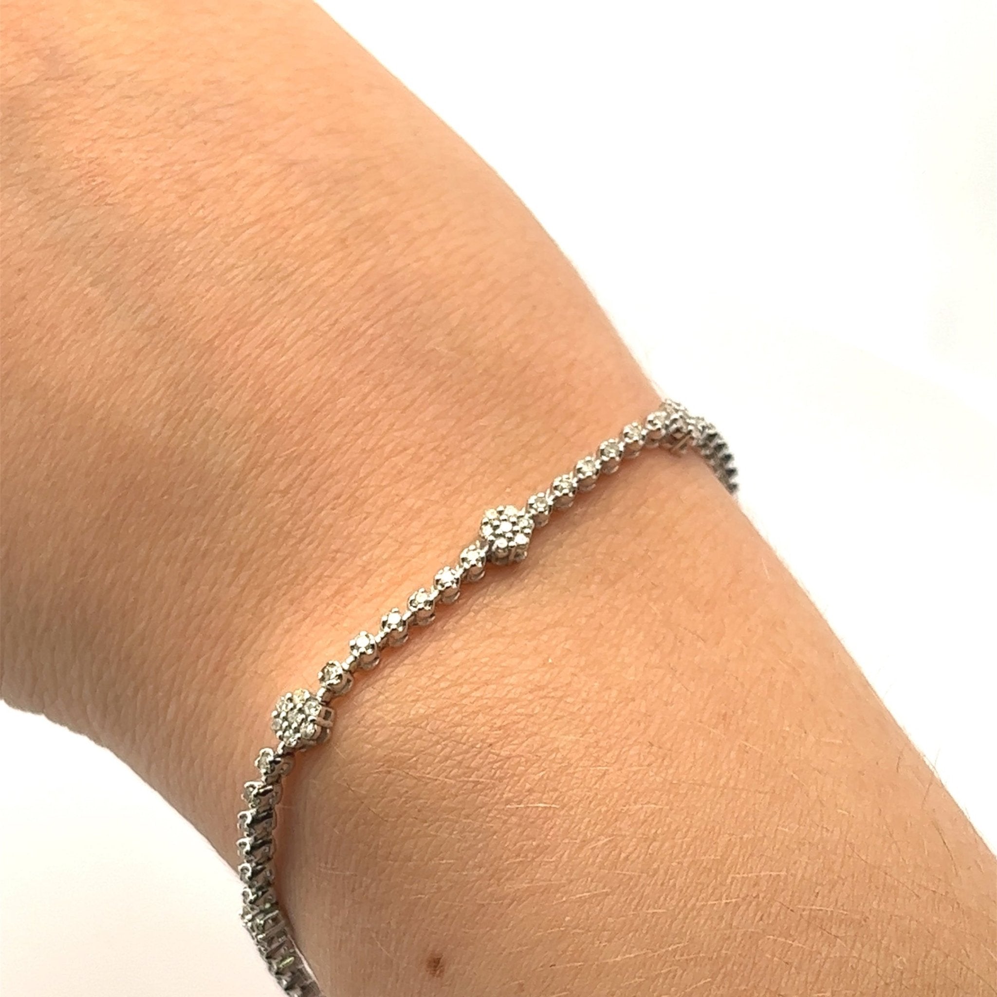 D1.1 14KW FLOWERS TENNIS BRACELET - C'SANTOS