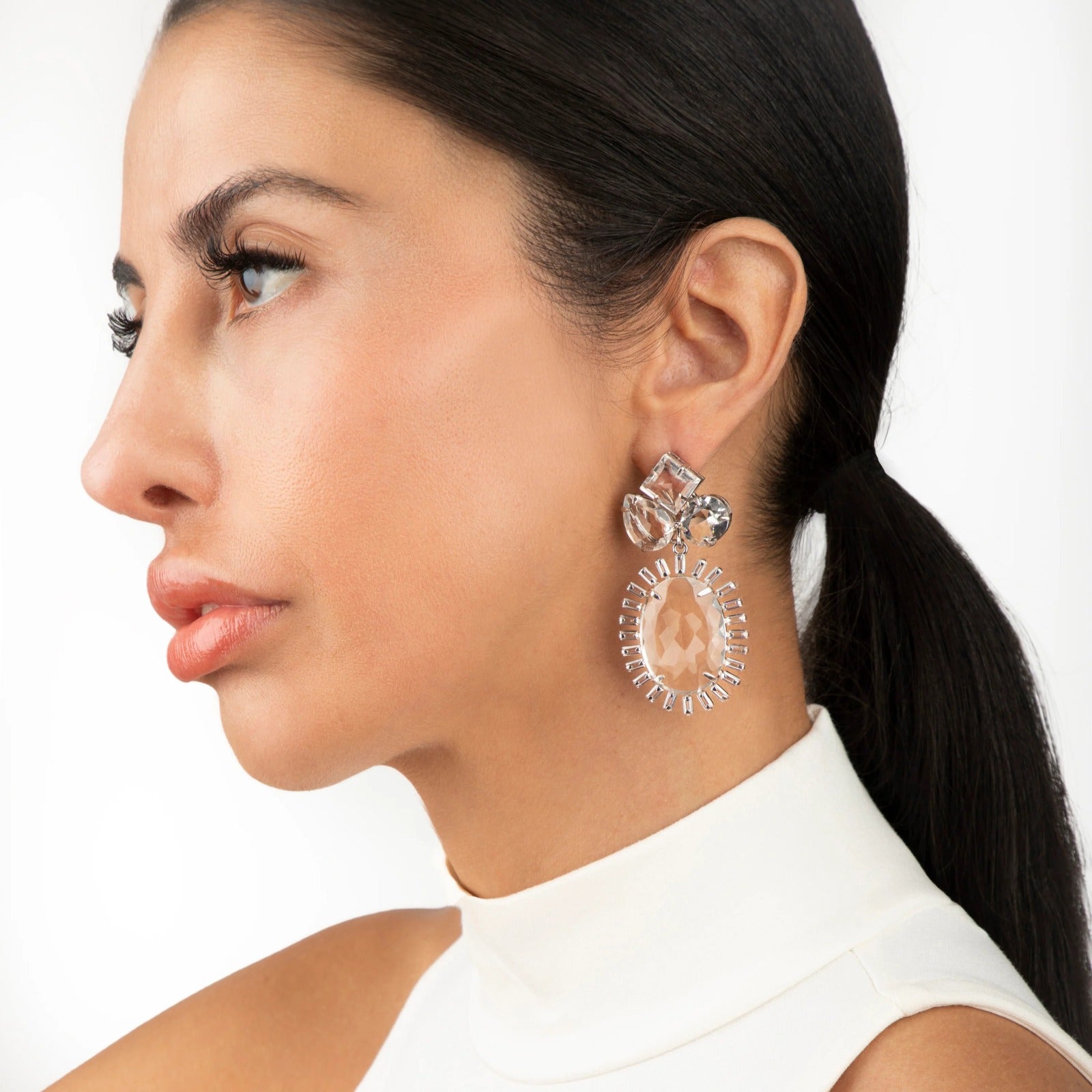 EARRINGS RHODIUM PLATED CLUSTER TOP ROUND OVAL PEAR SHAPE WITH 26X19 OVAL SURROUNDED WITH CZ ALL CLE