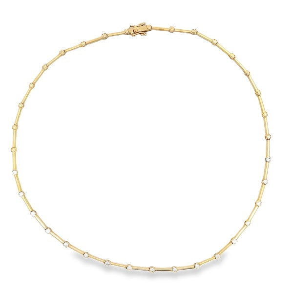 COLLAR DE TUBO Y DIAMANTES EN MONTURA EN ORO AMARILLO DE 14 K